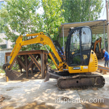 Mini compact menggunakan excavator JCB